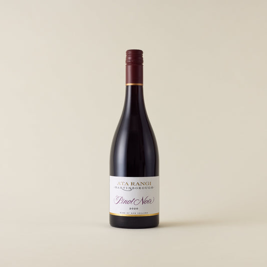 Red wine bottle with pinot noir wine inside. A white label with Ata Rangi logo. A burgundy screwtop and neck label.