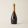 Sparkling wine bottle with Chardonnay wine inside. A Black label with No1 family estate logo. A gold foil cap and neck label.