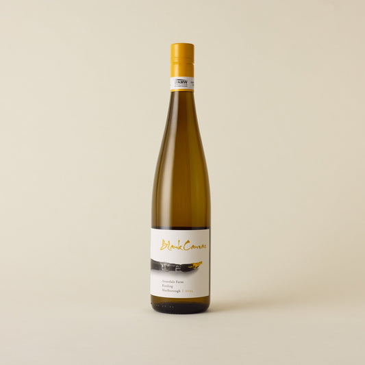 A white wine with riesling wine inside. White label with blank canvas logo and yellow paint brush on the front. A yellow screw cap and neck label.