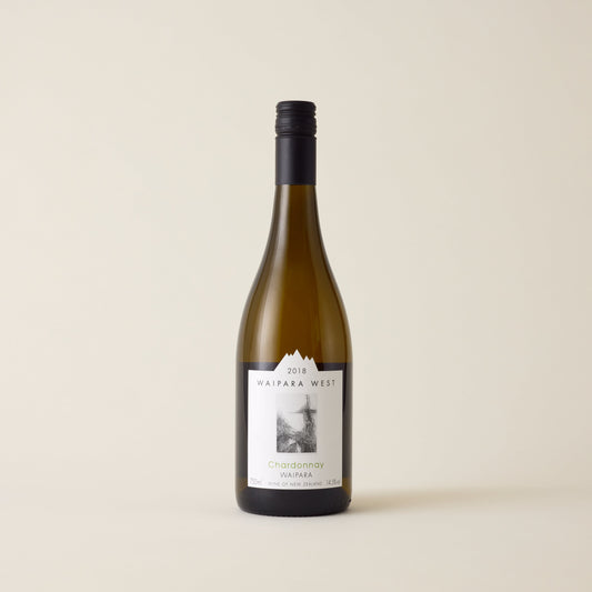 White wine bottle with chardonnay wine inside. A white label with Waipara West logo. A black screwcap and neck label.