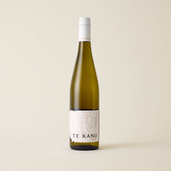 White wine bottle with Pinot Gris wine inside. A white label with Te Kano logo and flower design. A white screwtop and te kano logo on neck label.