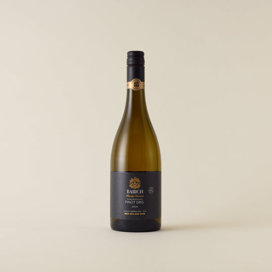 White wine bottle with Pinot Gris wine inside. A black label with Babich logo. A black screwcap and neck label.