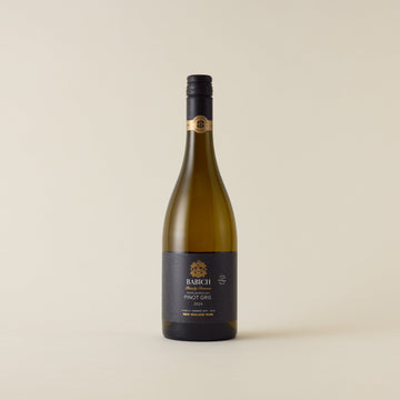 White wine bottle with Pinot Gris wine inside. A black label with Babich logo. A black screwcap and neck label.