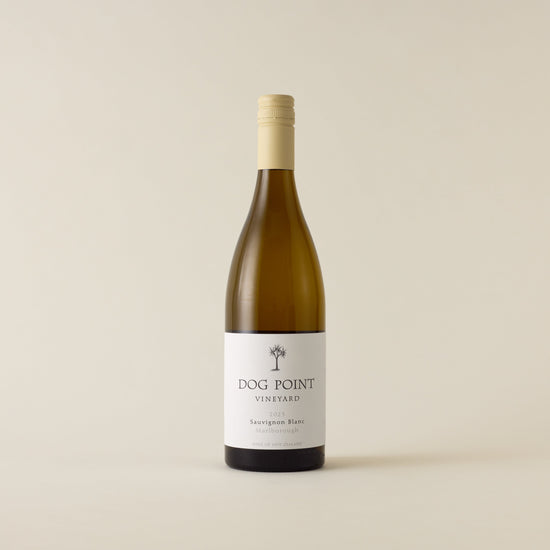 White wine bottle with sauvignon blanc wine inside. A white label with Dog Point logo. A cream screwtop and neck label. 