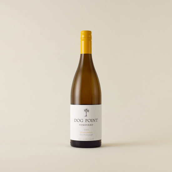 White wine bottle with chardonnay wine inside. A white label with Dog Point logo. A yellow screwtop and neck label. 