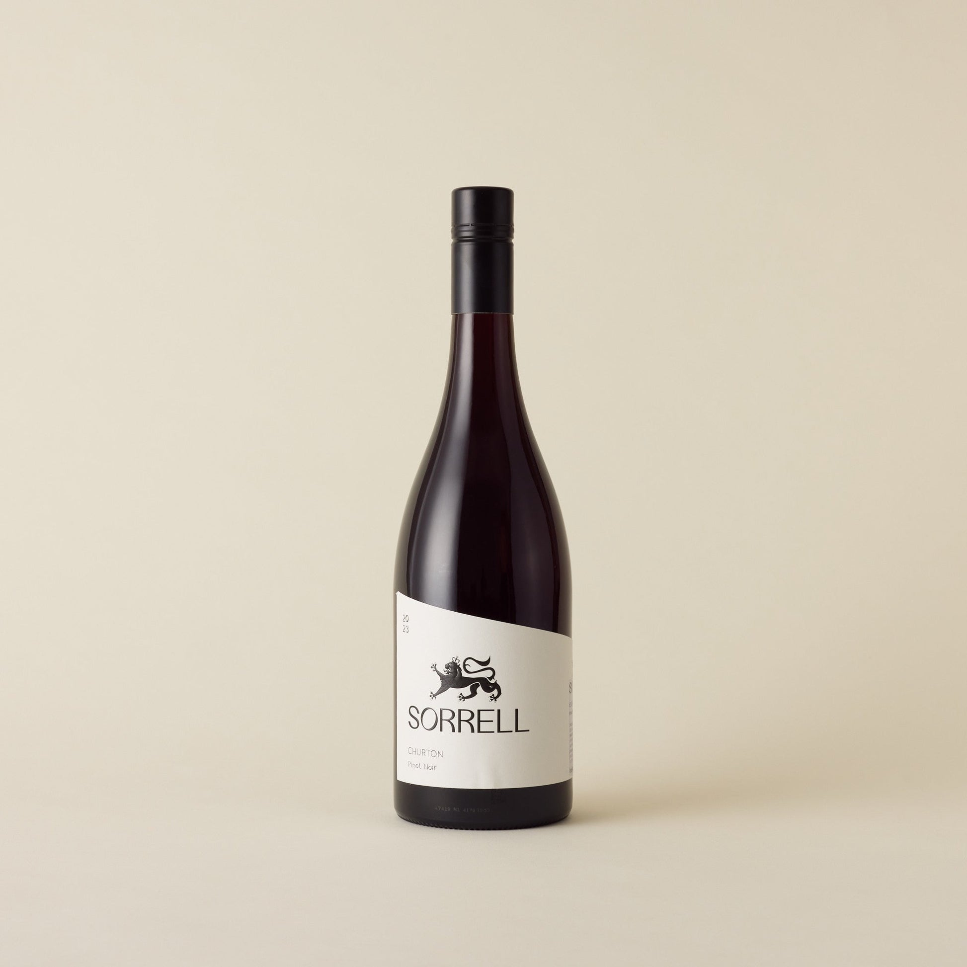 A red wine with pinot noir wine inside. White label with black Sorrell logo and lion design. A black screw cap and neck label. 