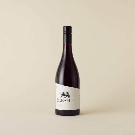 A red wine with pinot noir wine inside. White label with black Sorrell logo and lion design. A black screw cap and neck label. 