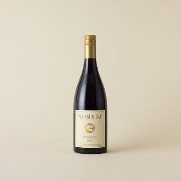 A red wine with pinot noir wine inside. Cream label with gold Pegasus Bay logo and Stallion design. A gold screw cap and neck label. 