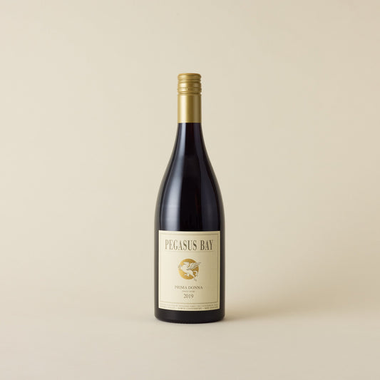 A red wine with pinot noir wine inside. Cream label with gold Pegasus Bay logo and Stallion design. A gold screw cap and neck label. 