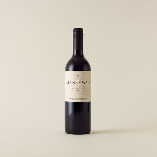Red wine bottle with malbec and merlot wine inside. A cream label with Man O War logo. A black screwcap and neck label.