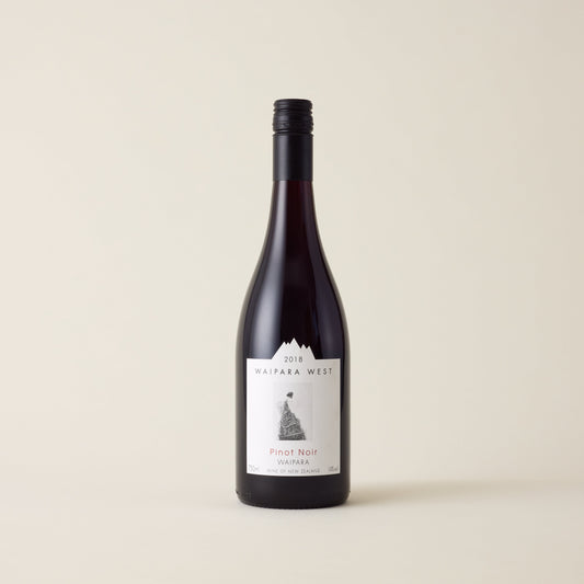 Red wine bottle with pinot noir wine inside. A white label with Waipara West logo. A black screwcap and neck label.