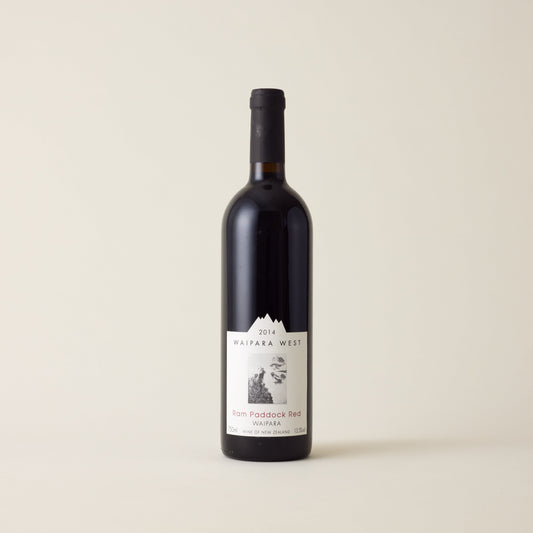 Red wine bottle with Cabernet Sauvignon wine inside. A white label with Waipara West logo. A black screwcap and neck label.